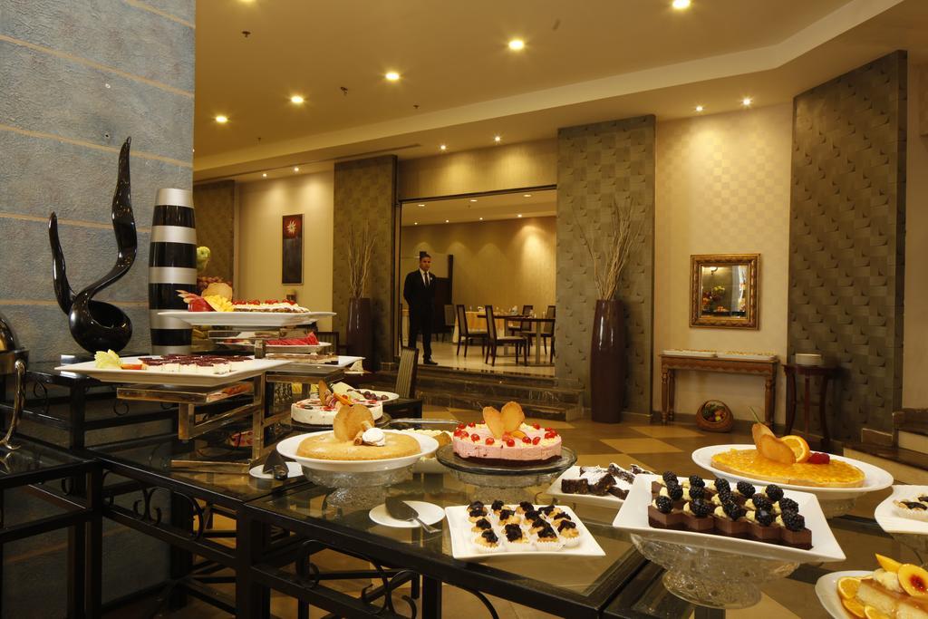 Golden Tulip Hail Экстерьер фото