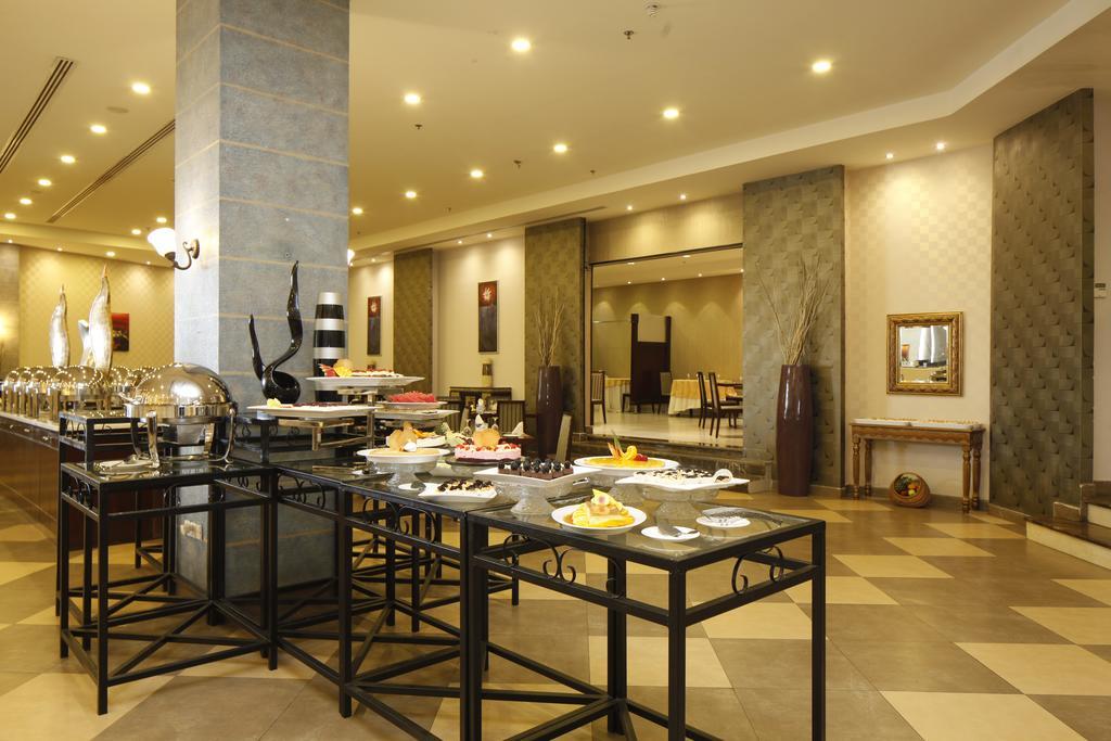 Golden Tulip Hail Экстерьер фото